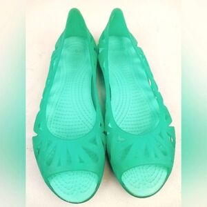 CROCS Adrina woman's light green jelly open toes slip on flats Size US 6